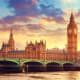 Big Ben and Houses of Parliament at sunset with Westminster Bridge over the River Thames in London